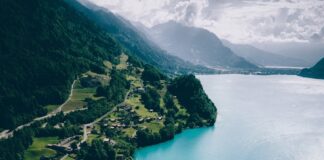 bird's eye view photography of boat on body of water