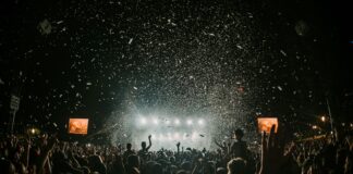 people gathering on concert field