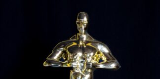 a silver and gold trophy