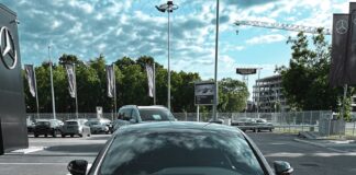 black mercedes benz car on road during daytime
