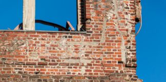 brown brick wall during daytime