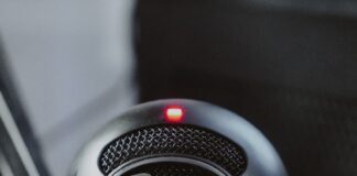 black and silver microphone on black microphone stand