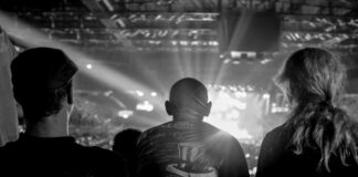 grayscale photography of people looking at direction