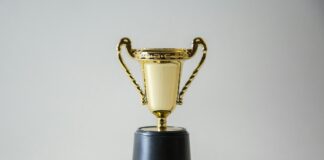yellow and white trophy
