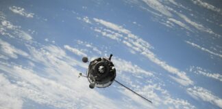 satellite flying on space