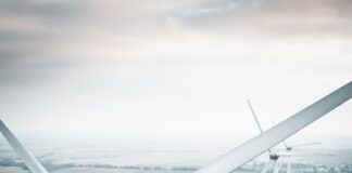 three white windmill during daytime
