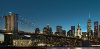 city skyline during night time