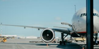 white airliner on runway