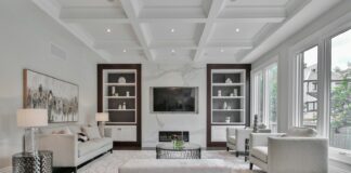 white wooden coffee table near white sofa
