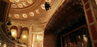 a large crowd of people in a large building