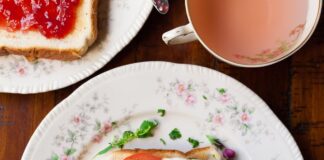 sunny-side up egg with bread beside fork