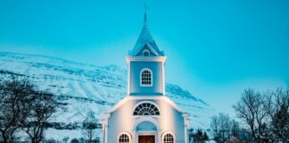 blue church during winter season