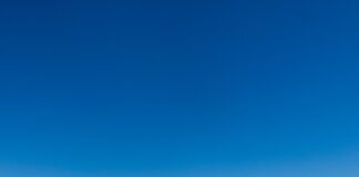 white and blue dome building near body of water during daytime