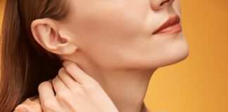 a person with the hand on the face