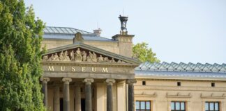 a building with a statue in front of it