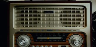 an old radio sitting on top of a table