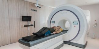 a person lying on a bed