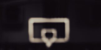 a close up of a basketball on a court