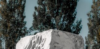 a large rock with a hole in it