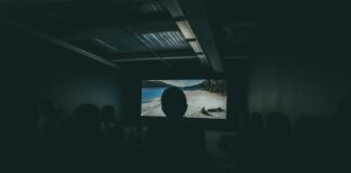 photo of people watching photo