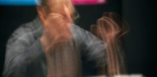 man in long-sleeved shirt