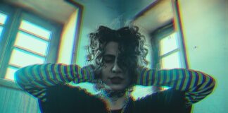 woman in blue and black striped long sleeve shirt