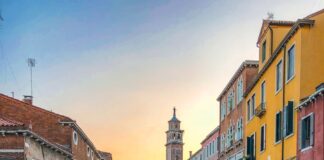 boats on water near buildings