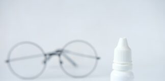 white plastic bottle with white cap