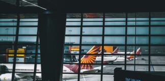 a group of people stand near each other