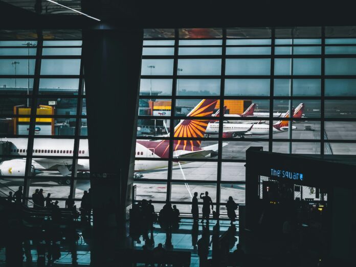 a group of people stand near each other