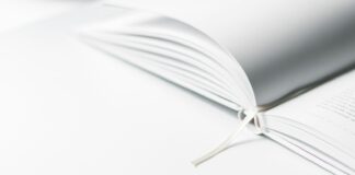white book marker on book page