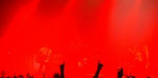 A crowd of people standing on top of a stage