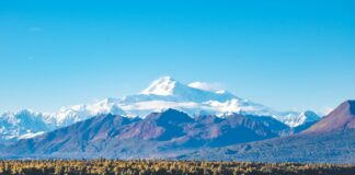 snow covered mountain during daytime