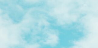 a church with a cross on the top of it