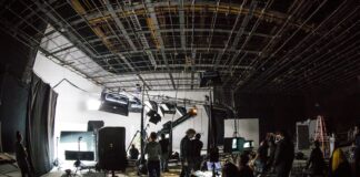 band playing on stage during daytime