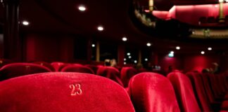 red cinema seat number 23
