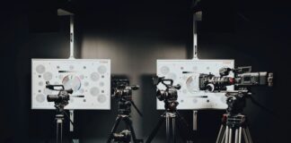 black video and DSLR cameras with tripods