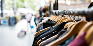 selective focus photography of hanged clothes
