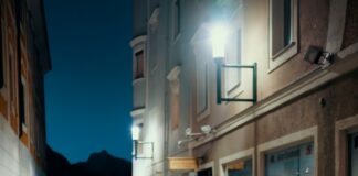 A pile of christmas tree sitting on the side of a street