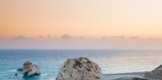 aerial photography of seashore beside body of water