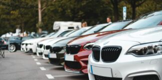white and black bmw m 3 on road during daytime