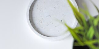 iphone xs on white table