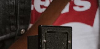 a person holding a camera