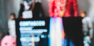 person holding black remote control