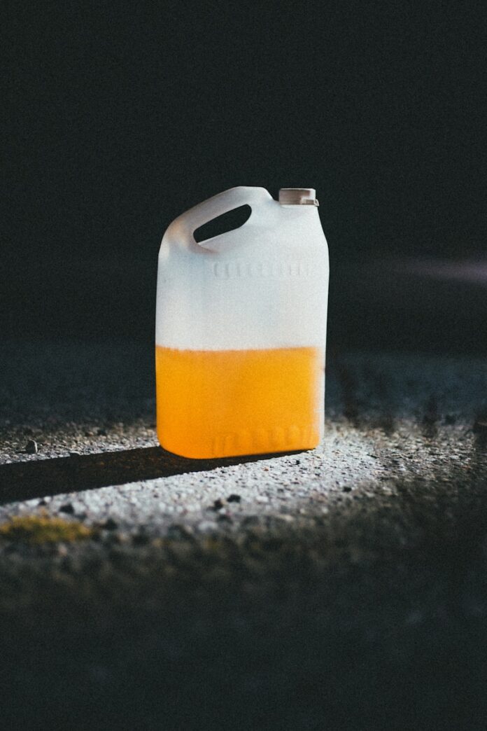 white and orange plastic container