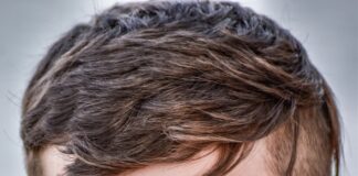 a person covering the face with the hands