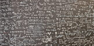 a blackboard with a lot of writing on it