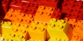 a close up of many different colored legos