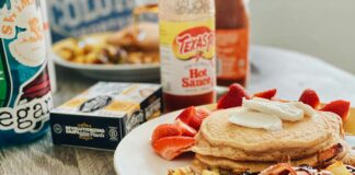 burger and fries on white ceramic plate