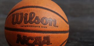 Wilson NCAA basketball on black board